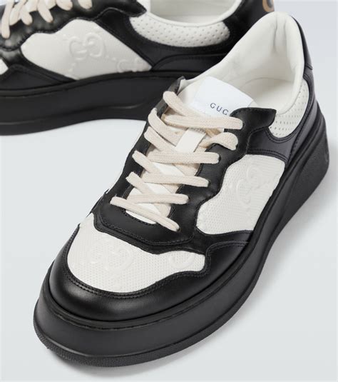 gucci gg embossed leather sneakers